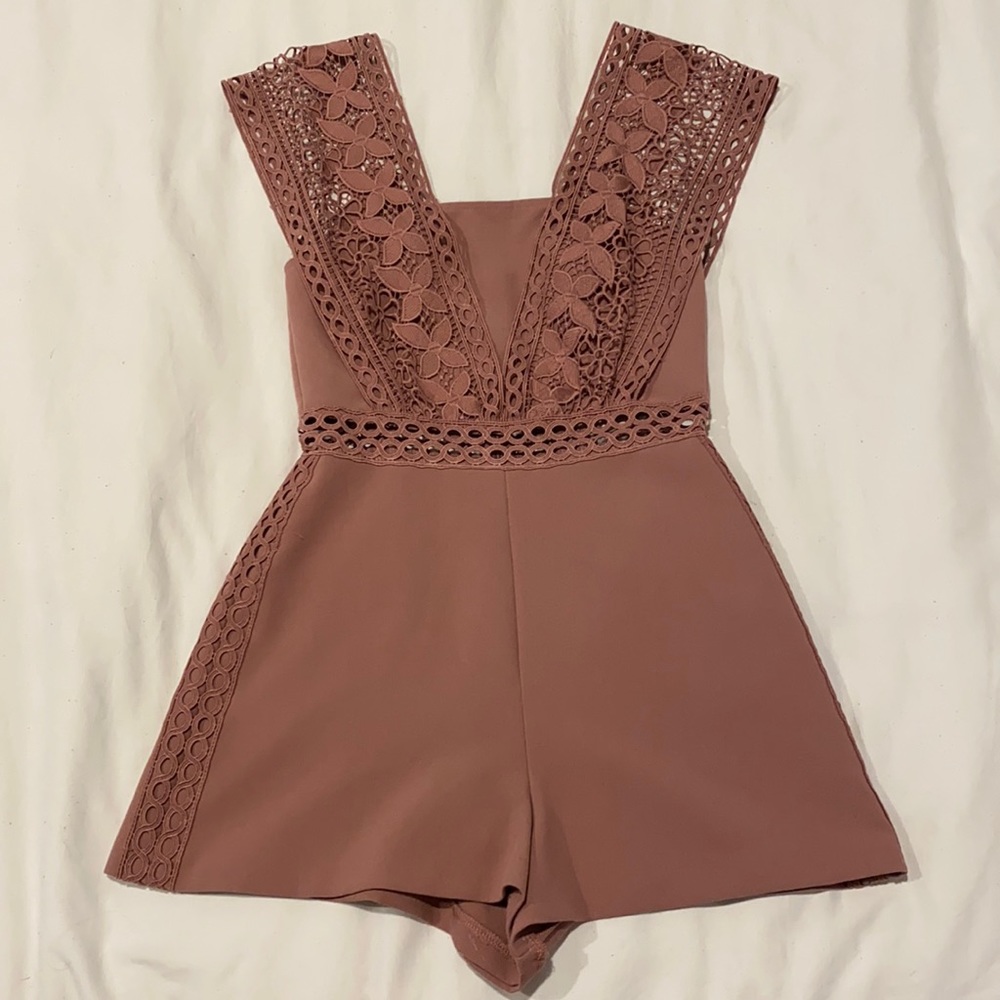 Topshop romper with cute flower details. Size 4.